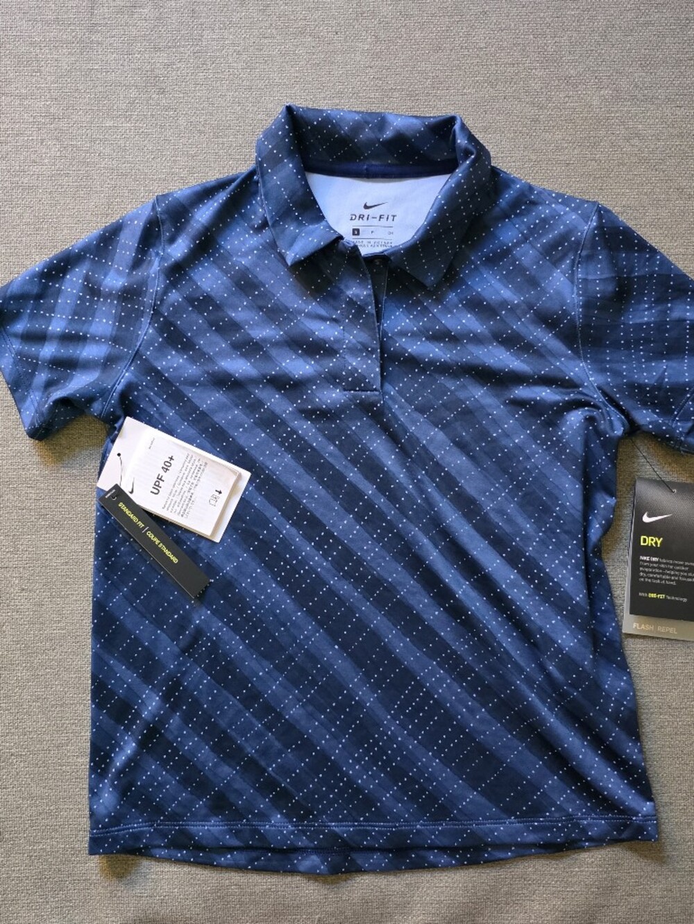 Nike Navy Blue Polo with White Dot Accent